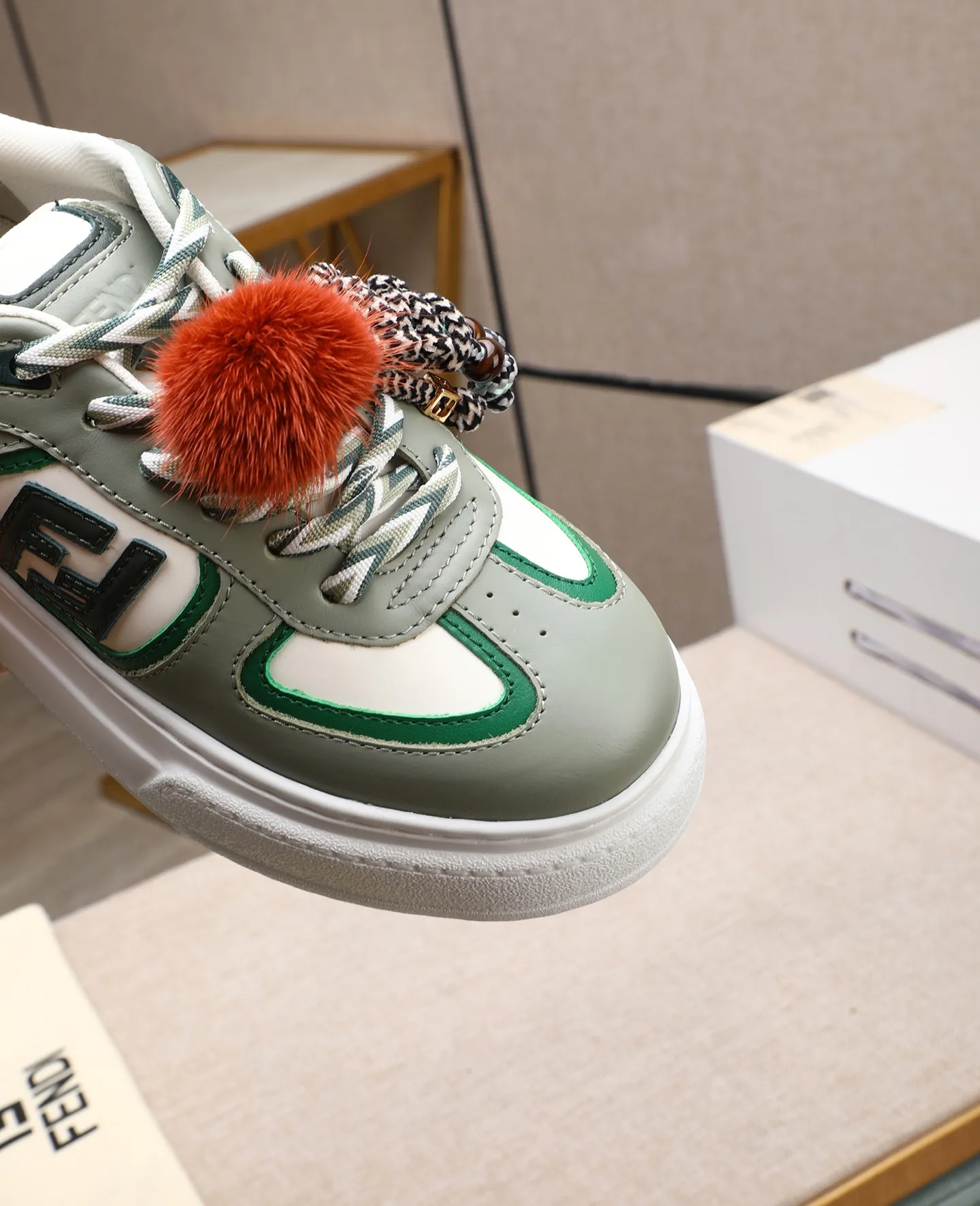 Men's shoes 💰740 Top quality Fendi Match series 25 latest colors Pendant thick sole lace casual FENDI Match lace. Made of light pink leather with white and ocher brown details. Contrast leather FF appliqué on the sides and hiking laces in white, pink and ocher brown. Thick rubber sole with oversized embossed FENDI lettering on the heel. Metal ring charm on the tongue: A small braided doll with contrasting mink fur details and gold metallic FF on the right shoe. The left shoe features a braided cord with contrasting mink double pom poms, metallic FF beads, and Pequin print pattern and logo. Upper: Original custom-made imported first-layer cowhide. Inner lining: Imported custom-made breathable mesh lining. Sole: Original open-molded ultra-light foam material. Bottom thickness: 5CM. Number of yards: women's 35-40 (custom-made 40 non-refundable).